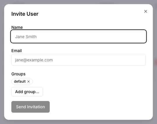 Invite User dialog with name, email, and group fields
